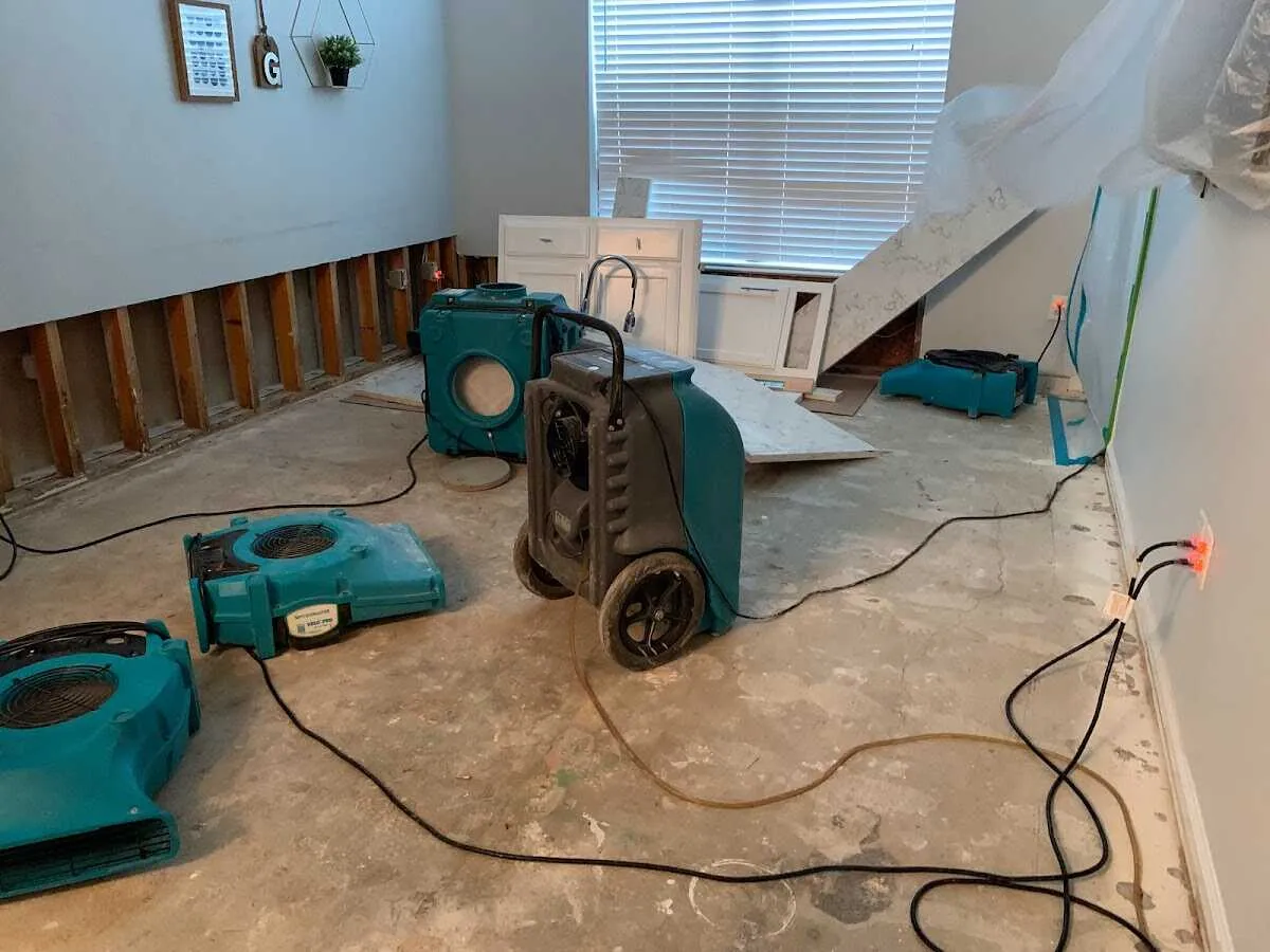 Dehumidifier in flood-cut room for Water Damage Restoration in Glastonbury